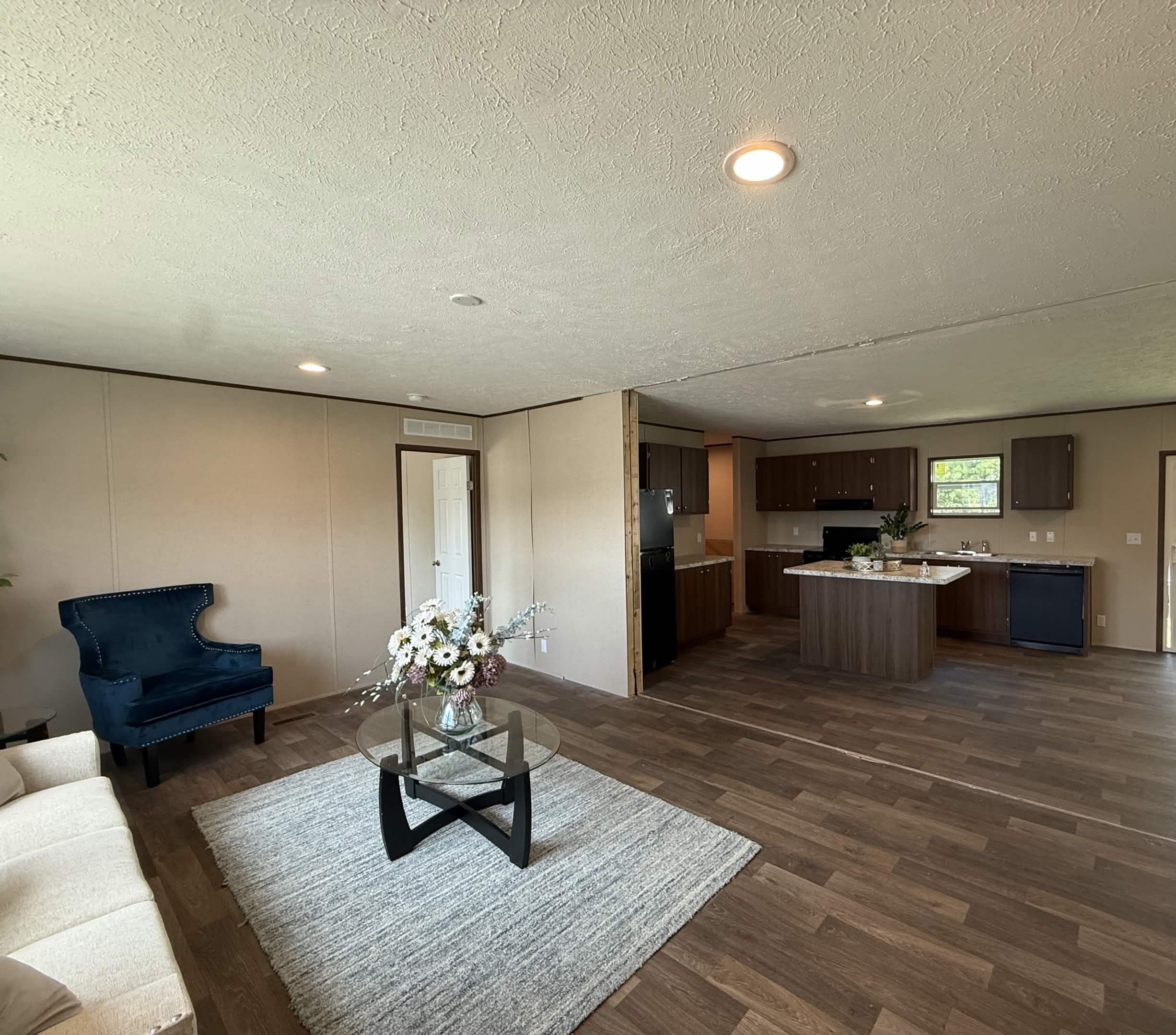 Manufactured home kitchen before the Built Different upgrades